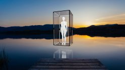 Human protected and isolated from the outside in a glass box. — Stock Photo