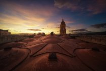 Incredible view from rooftop of old magnificent Cathedral of Malaga with cloudy sunset sky — Stock Photo
