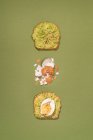 Top view composition of avocado and boiled eggs toasts for breakfast — Stock Photo