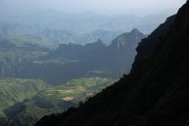 Magnificent drone view of Simien Mountains and green highland valley on sunny day — Stock Photo
