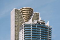 Low angle view of modern building in blue sky, Benidorm city in Spain — Stock Photo