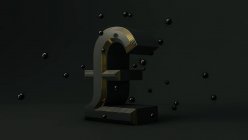 Símbolo da libra. Conceito de dinheiro no fundo preto — Fotografia de Stock