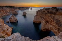 From above spectacular view of Praia Da Marinha in endless sea with horizon line under sunste sky in Lagoa, Algarve Portugal — Stock Photo