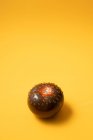 Overhead view of ripe tomato with pure water drips representing doughnut with chocolate glaze concept — Stock Photo