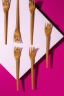 From above view of brown eco friendly fork on pink carton background — Stock Photo