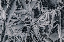 From above of frozen Lake Baikal surface with chaotic pattern and cracks as abstract background — Stock Photo