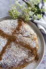 From above of appetizing bastilla with aromatic spices on table near flower sprig during Ramadan holidays — Fotografia de Stock