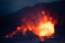 Blur close-up Fagradalsfjall volcano erupting in Iceland between clouds of smoke — Stock Photo