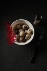 A bowl of quail eggs seen from above — Stock Photo
