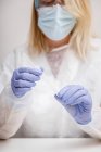 Female doctor preparing to do a pcr test — Stock Photo