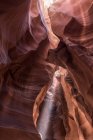 Picturesque landscape of narrow and deep slot canyon illuminated by daylight placed in Antelope Canyon in America — Stock Photo