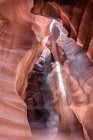 Picturesque landscape of narrow and deep slot canyon illuminated by daylight placed in Antelope Canyon in America — Stock Photo