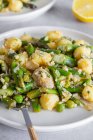 Delicious plate of gnocchi with green asparagus — Stock Photo