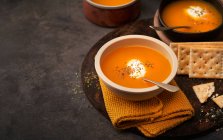 Delicious plates of creamy pumpkin soup seen from above — Stock Photo