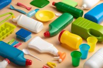 Fundo de diversos pacotes de plástico colorido — Fotografia de Stock