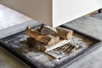 Close up of fireplace full of firewoods — Stock Photo
