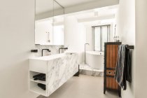 Modern bathroom in a luxury house with individual design — Stock Photo