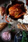 From above beautiful thanksgiving dinner with roasted chicken Pollo pibil on wooden table — Stock Photo