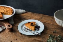 From above piece of delicious pumpkin pie on plate on lumber table — Stock Photo