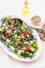 From above delicious prosciutto, mozzarella and asparagus salad on white table background — Stock Photo