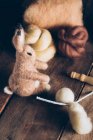 Hand made easter rabbit made of wool and felt on dark wooden table — Stock Photo