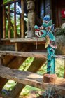 Statue of dragon with decor on old staircase of construction on sunny day in Bali Indonesia — Stock Photo