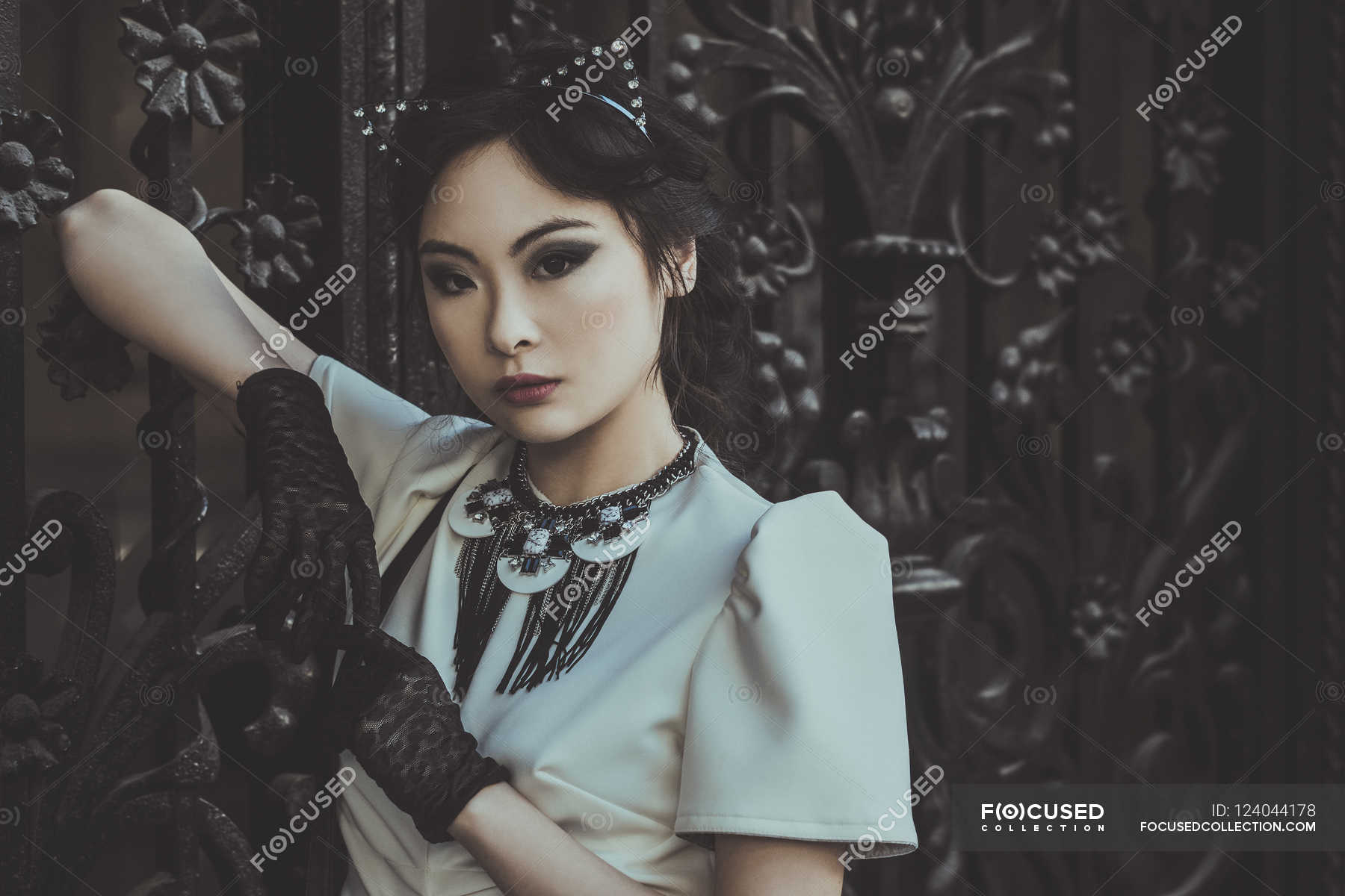 Attractive woman wearing cat ears — posing, female Stock Photo