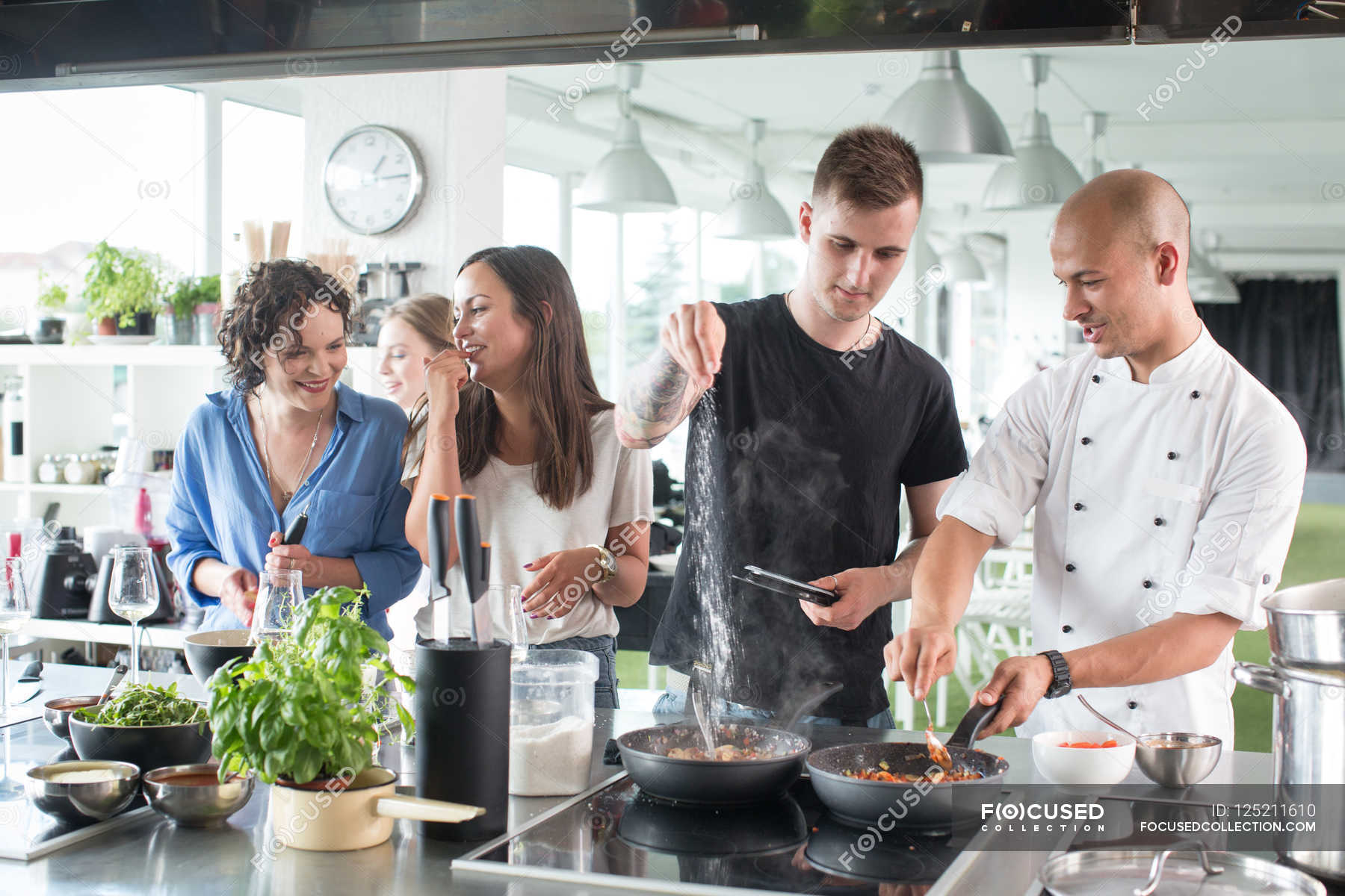 Man and chef salting food — talk, caucasian - Stock Photo | #125211610