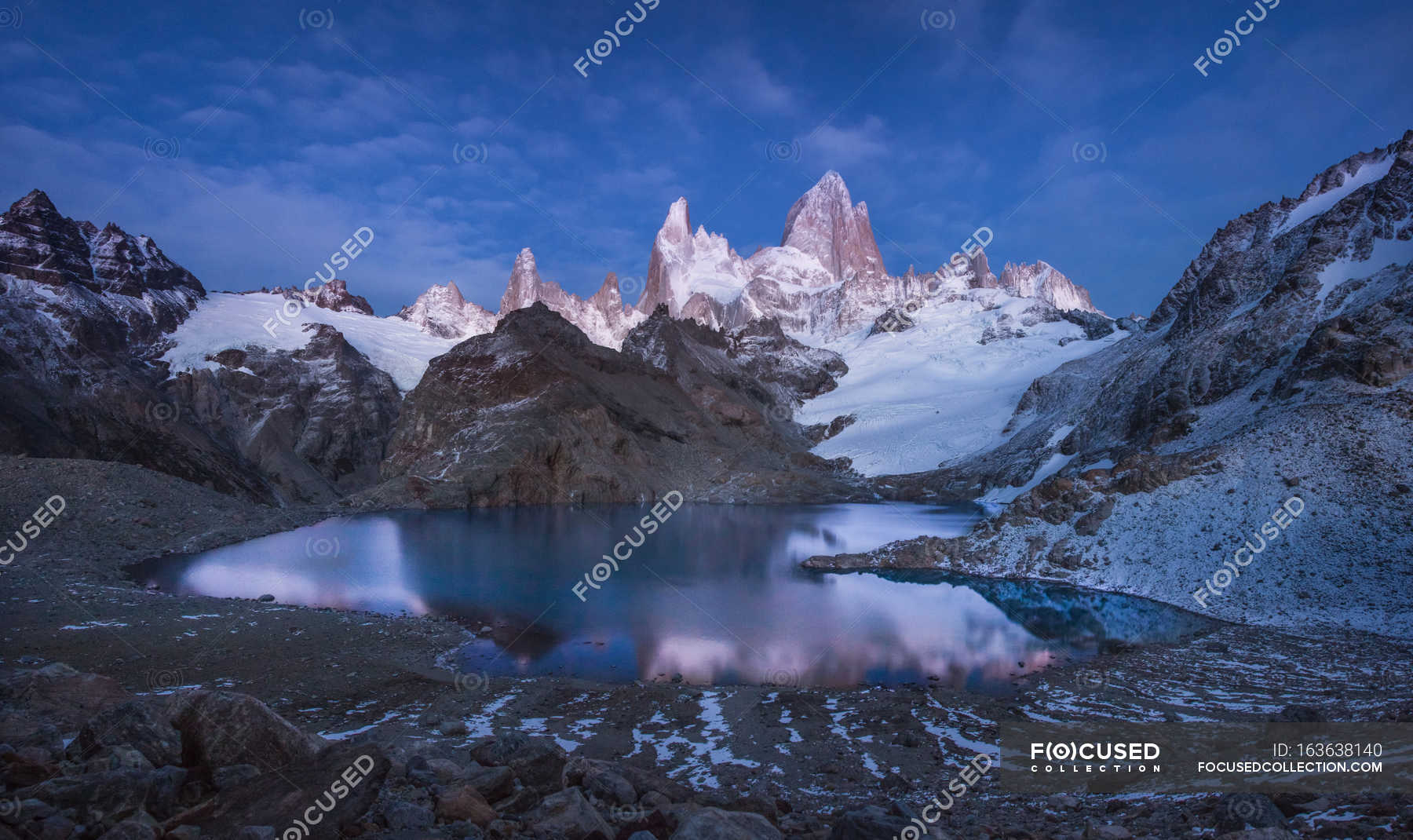 Lake In Snowy Rocky Mountains Horizontal Majestic Stock Photo