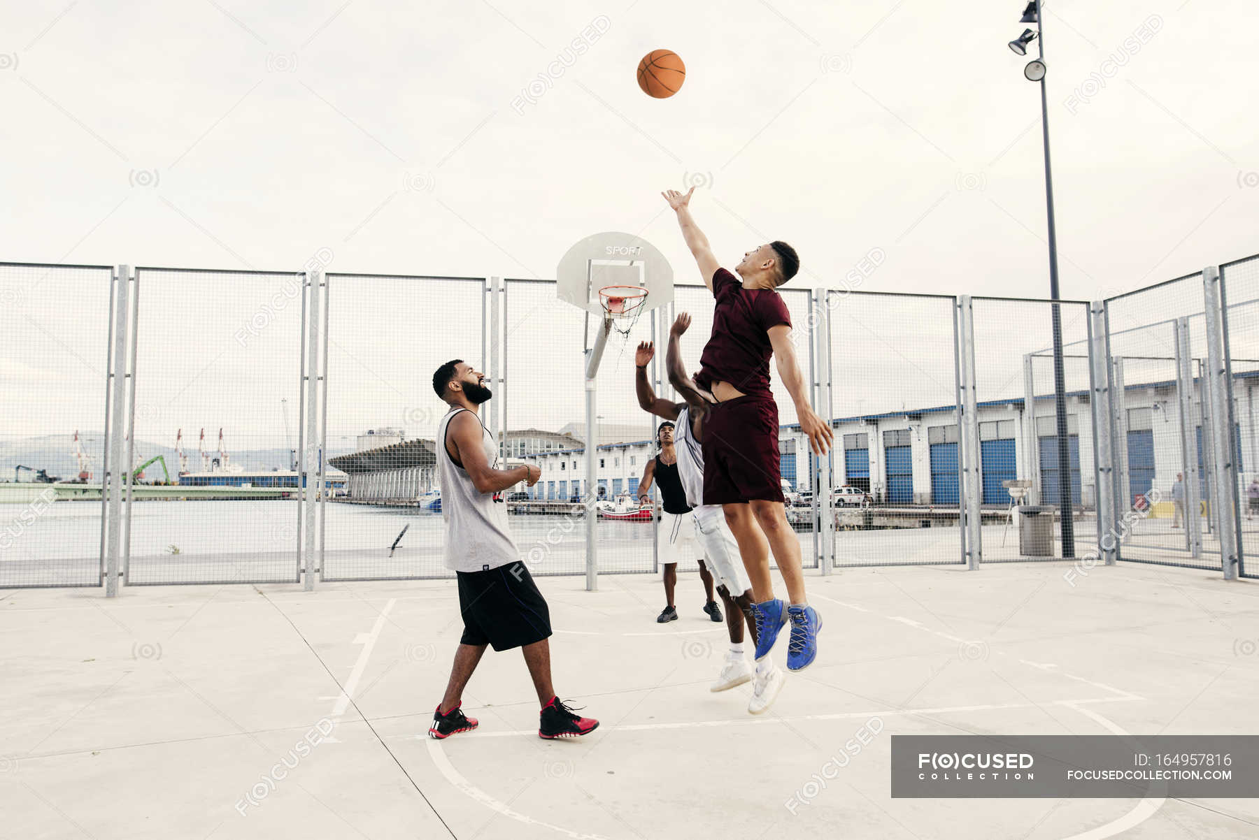 Men playing basketball — active, vacation Stock Photo 164957816