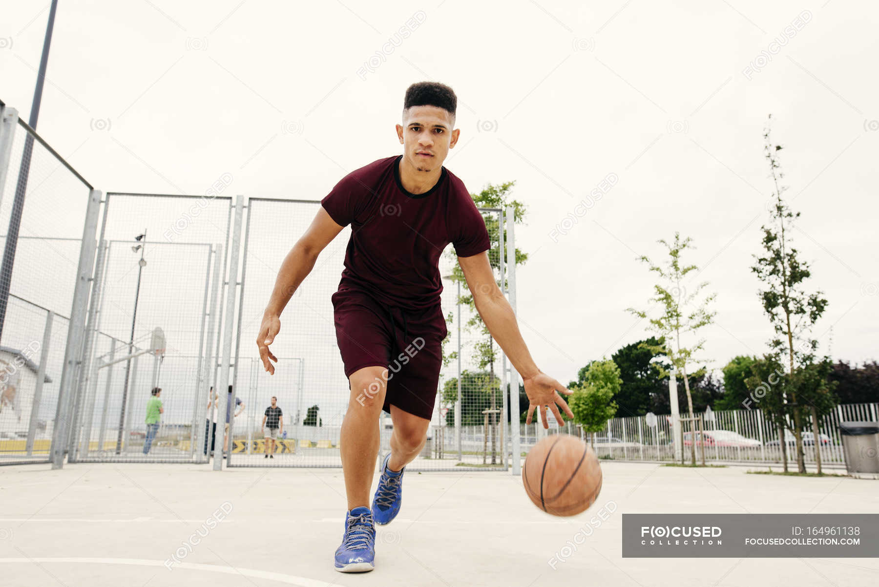 Man running with basketball — action, leisure Stock Photo 164961138