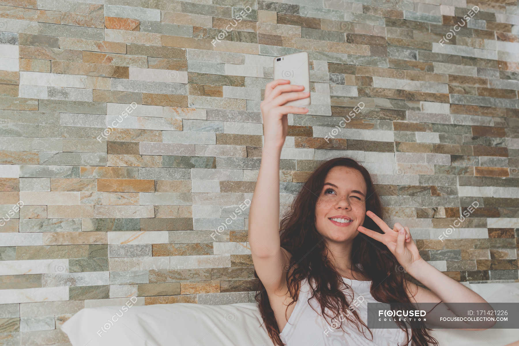 Ginger Woman With Wavy Hair Making Selfie Toothy Smile Long