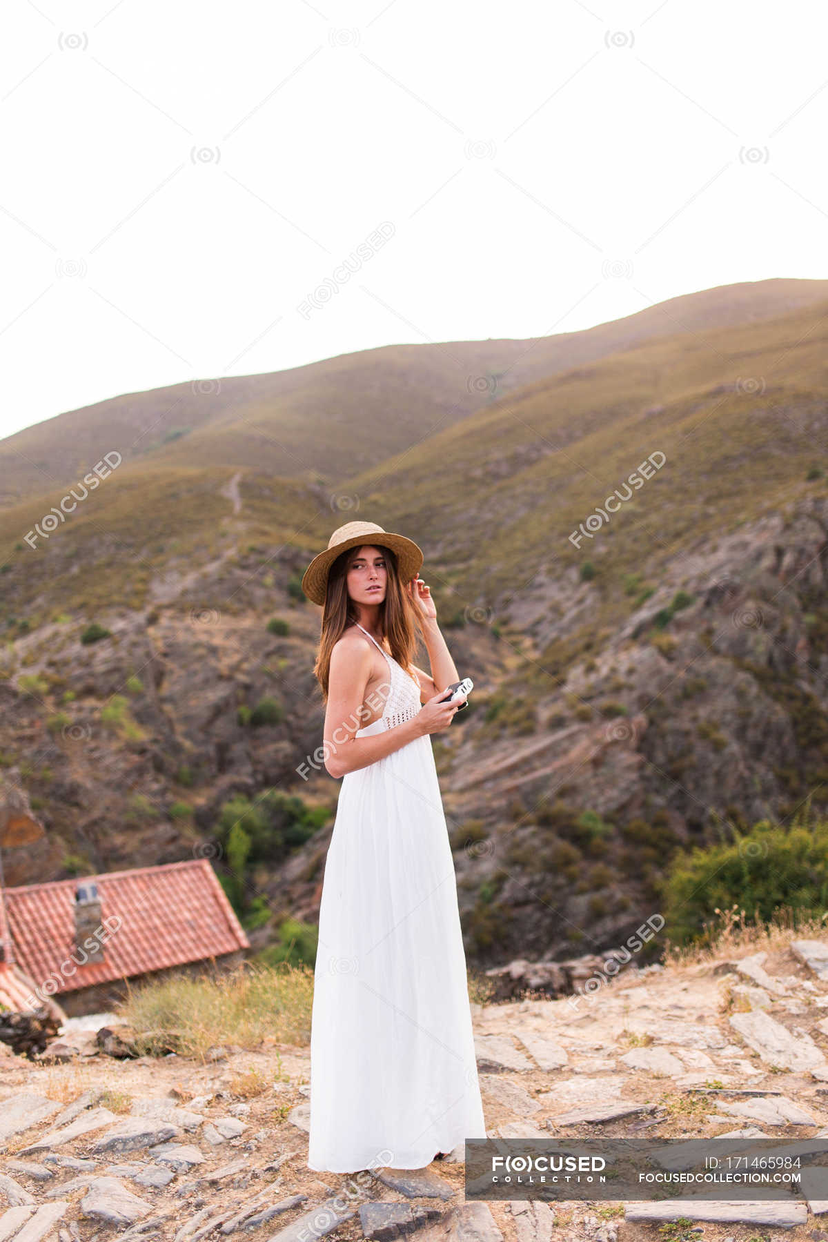 Girl with camera on top of hill — vacation, journey - Stock Photo ...