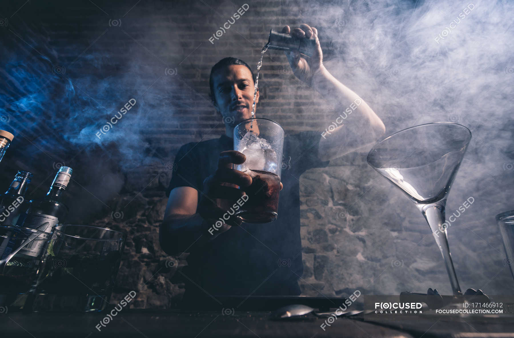 Man pouring ingridient for cocktail — club, colours - Stock Photo ...