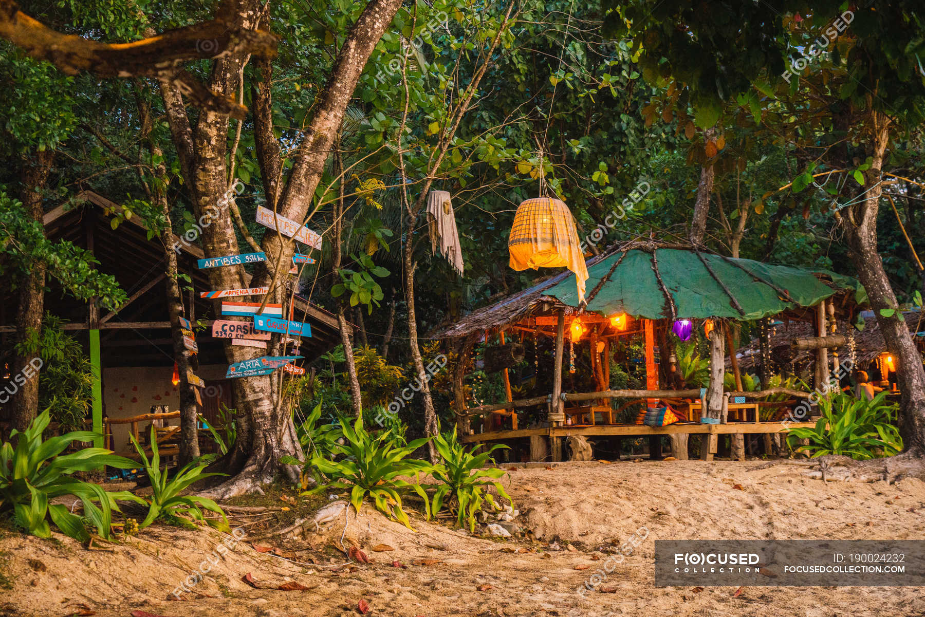 Small wooden bungalow with straw roof at forest — exterior, travel ...