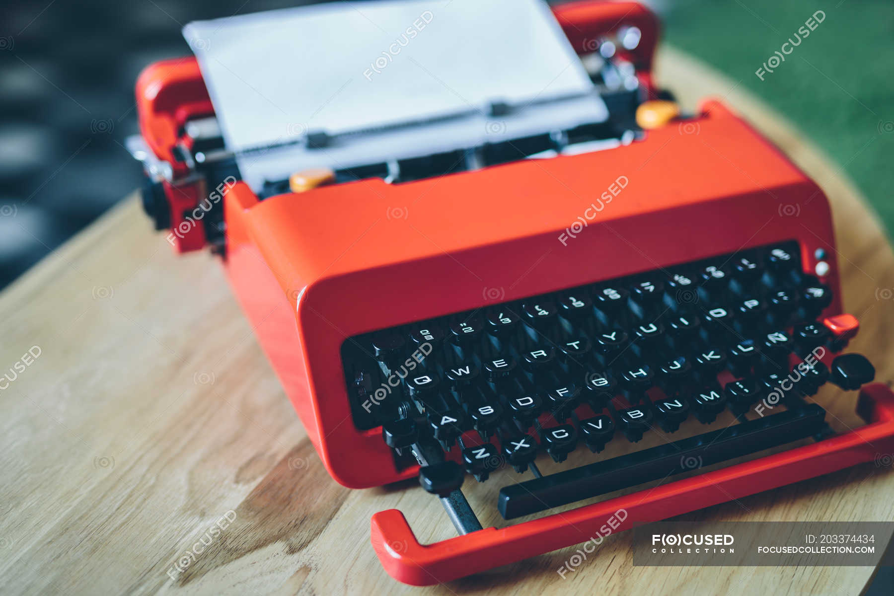 Red typewriter paper sheet inserted — indoors, retro - Photo | #203374434