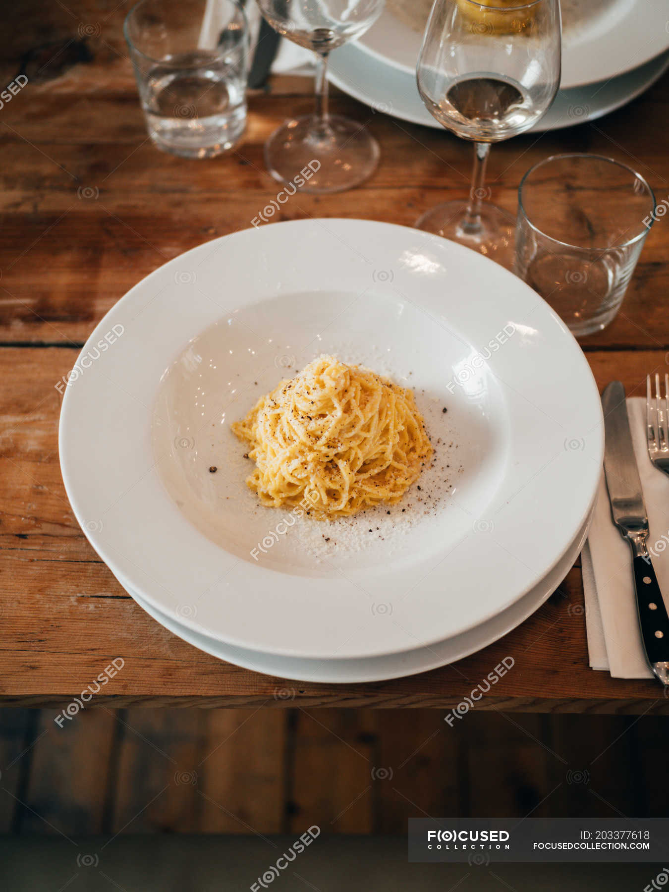 Portion of spaghetti on plate — prepared, home - Stock Photo | #203377618