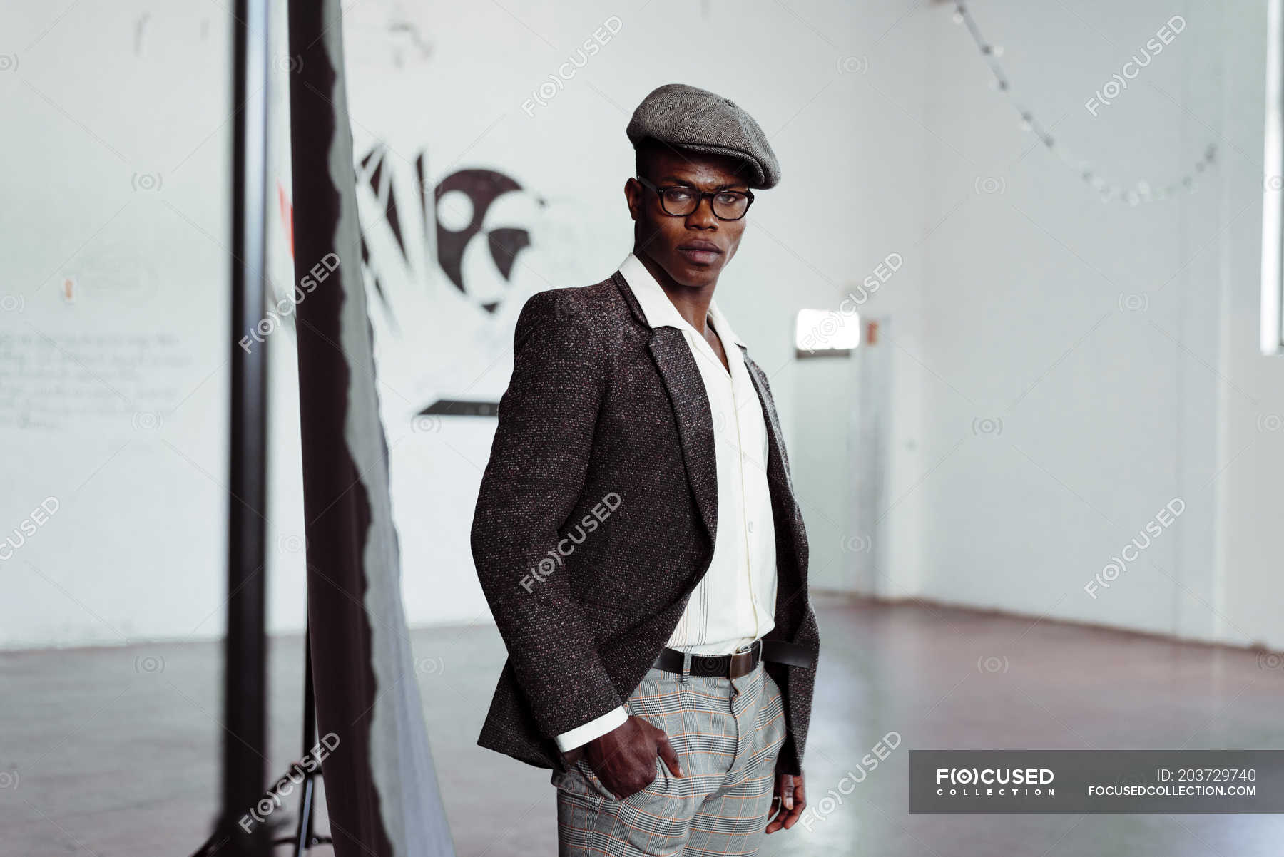 Stylish black man posing in studio — ethnicity, confident - Stock Photo ...