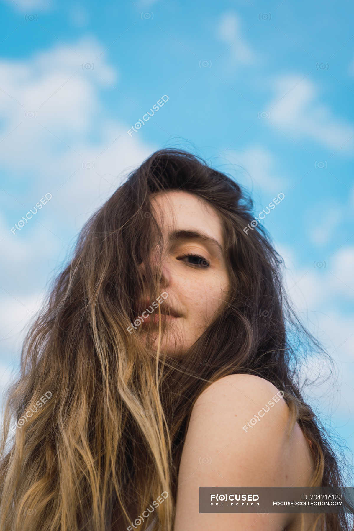 Sensual Young Woman Looking At Camera On Background Of Blue Sky — Daytime Outdoors Stock 1108