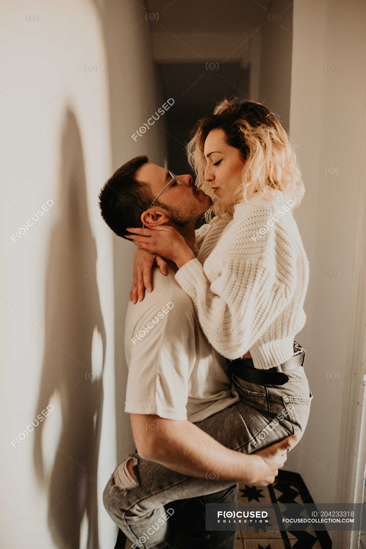 https://st.focusedcollection.com/9163412/i/1800/focused_204233318-stock-photo-passionate-man-woman-embracing-kissing.jpg