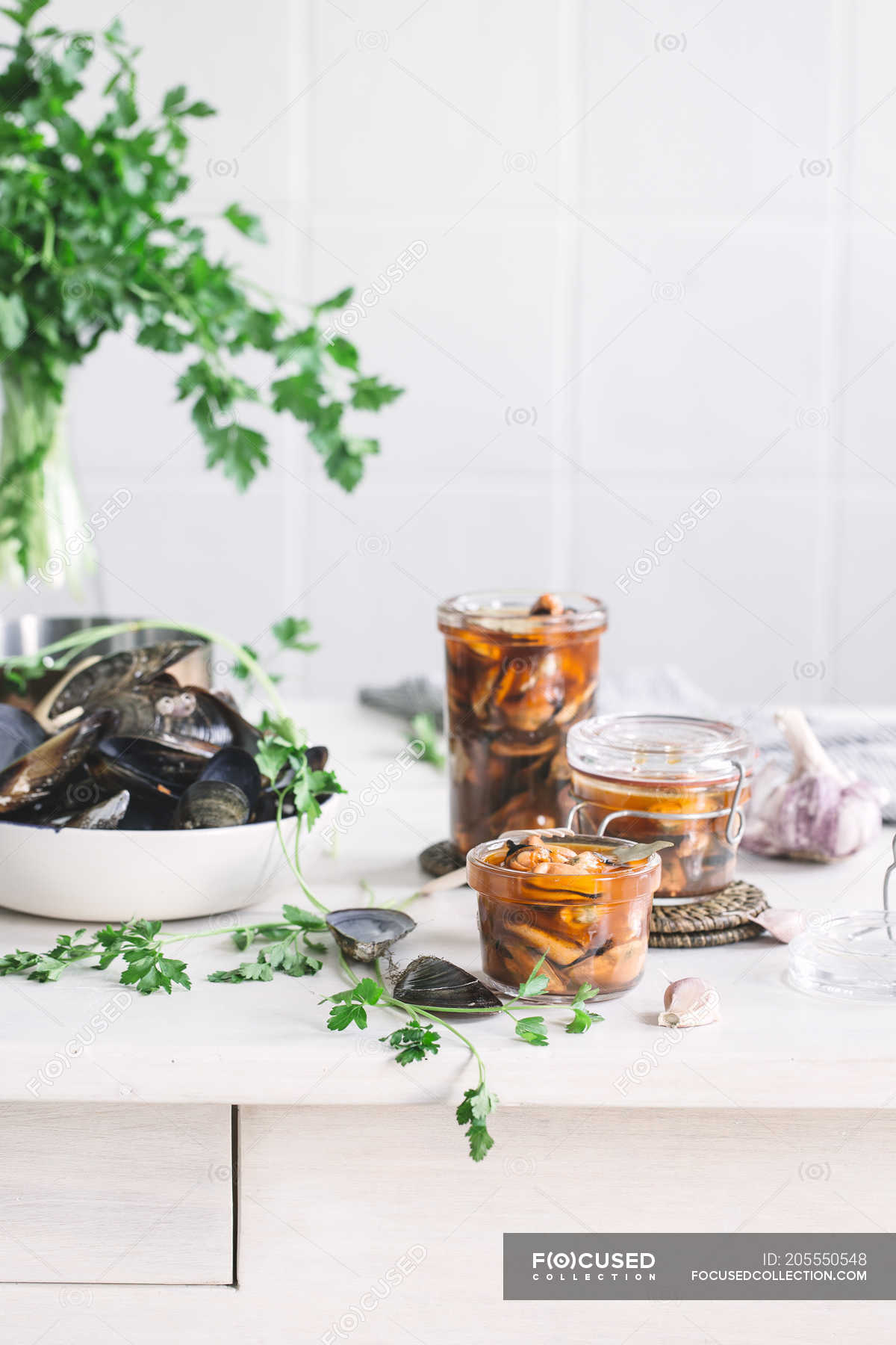 Mussels in glass jars — preparing, nutrition Stock Photo 205550548