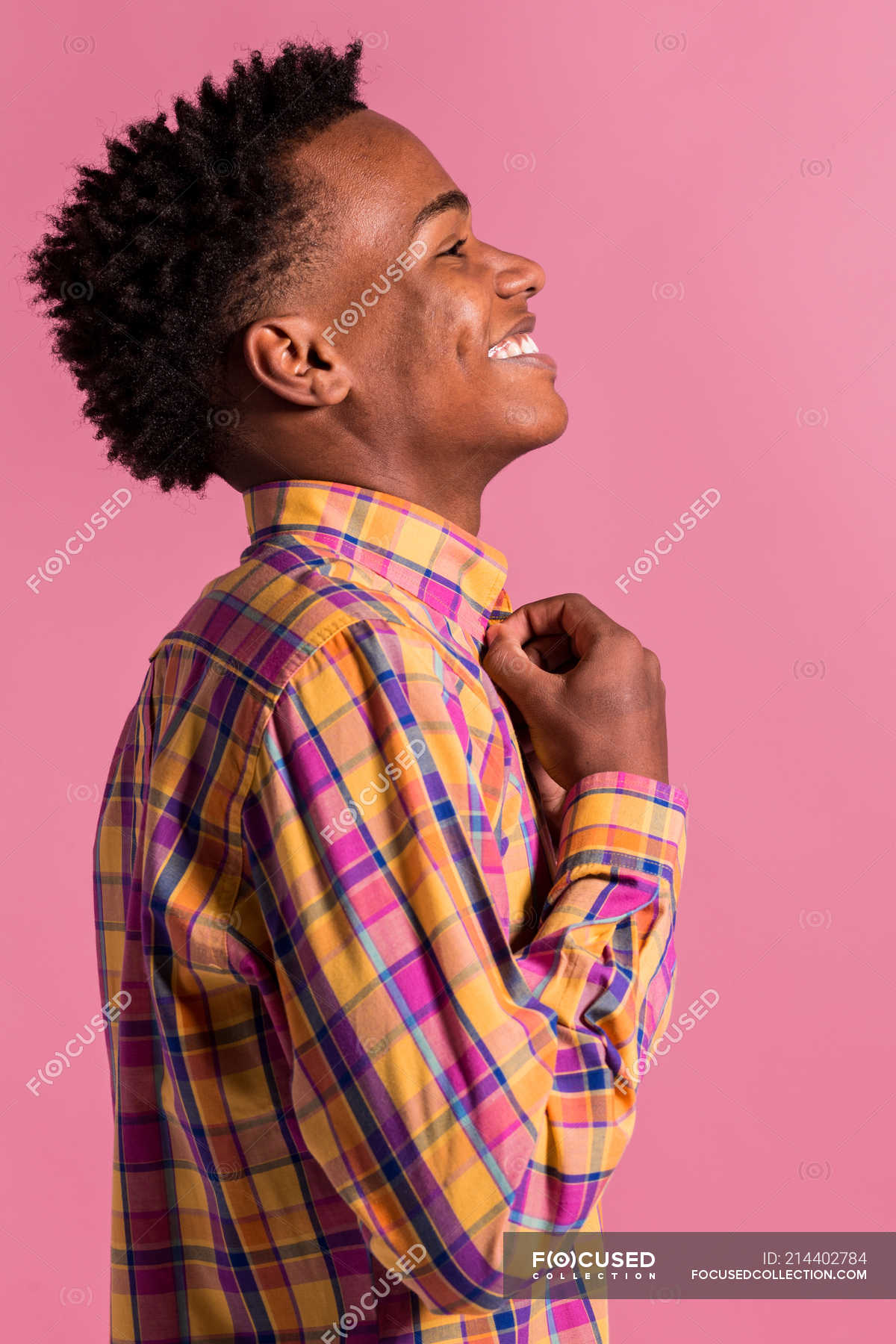 Laughing Hipster Black Man In Colorful Shirt On Pink Background
