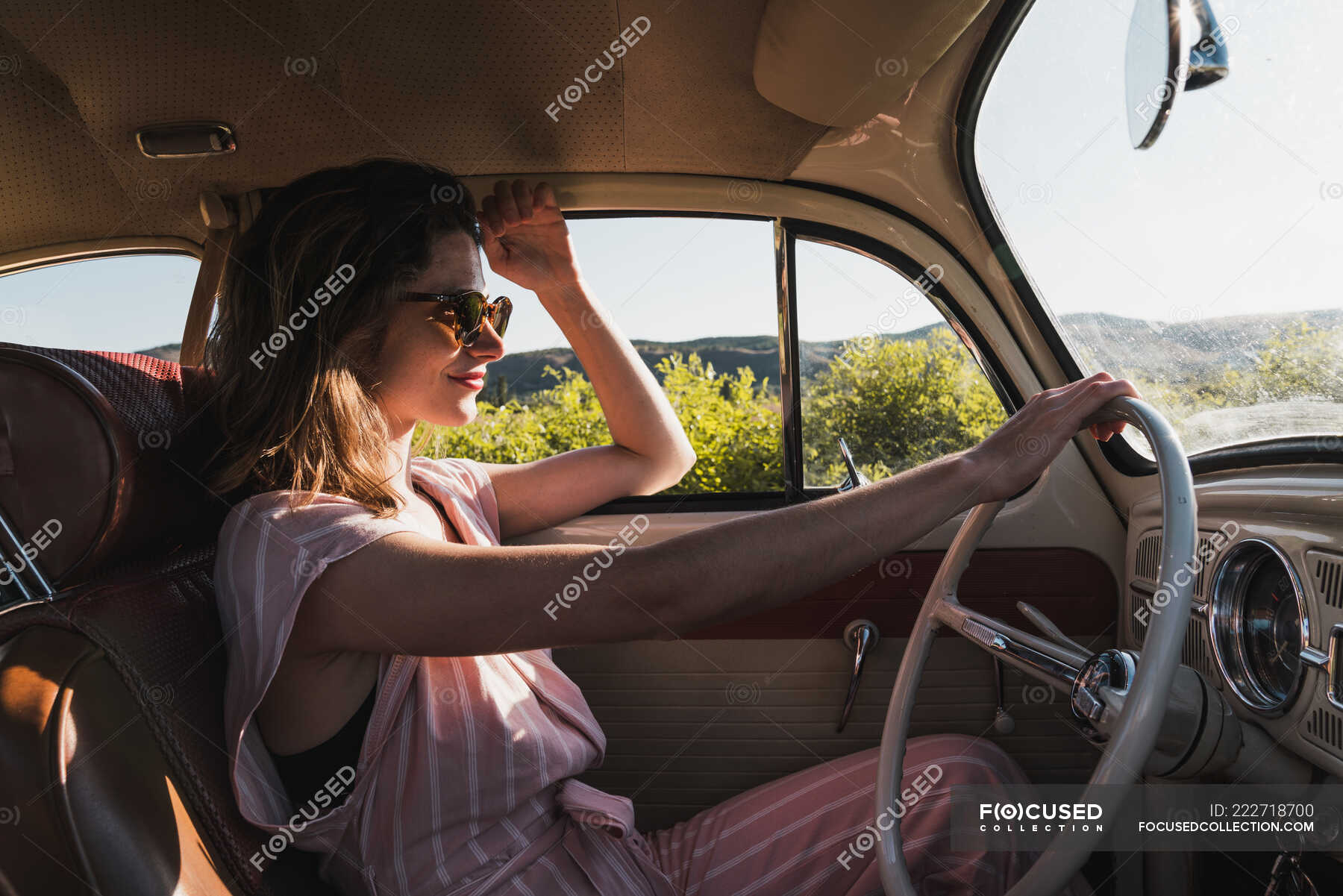 Woman driving a vintage car — journey, trip - Stock Photo | #222718700