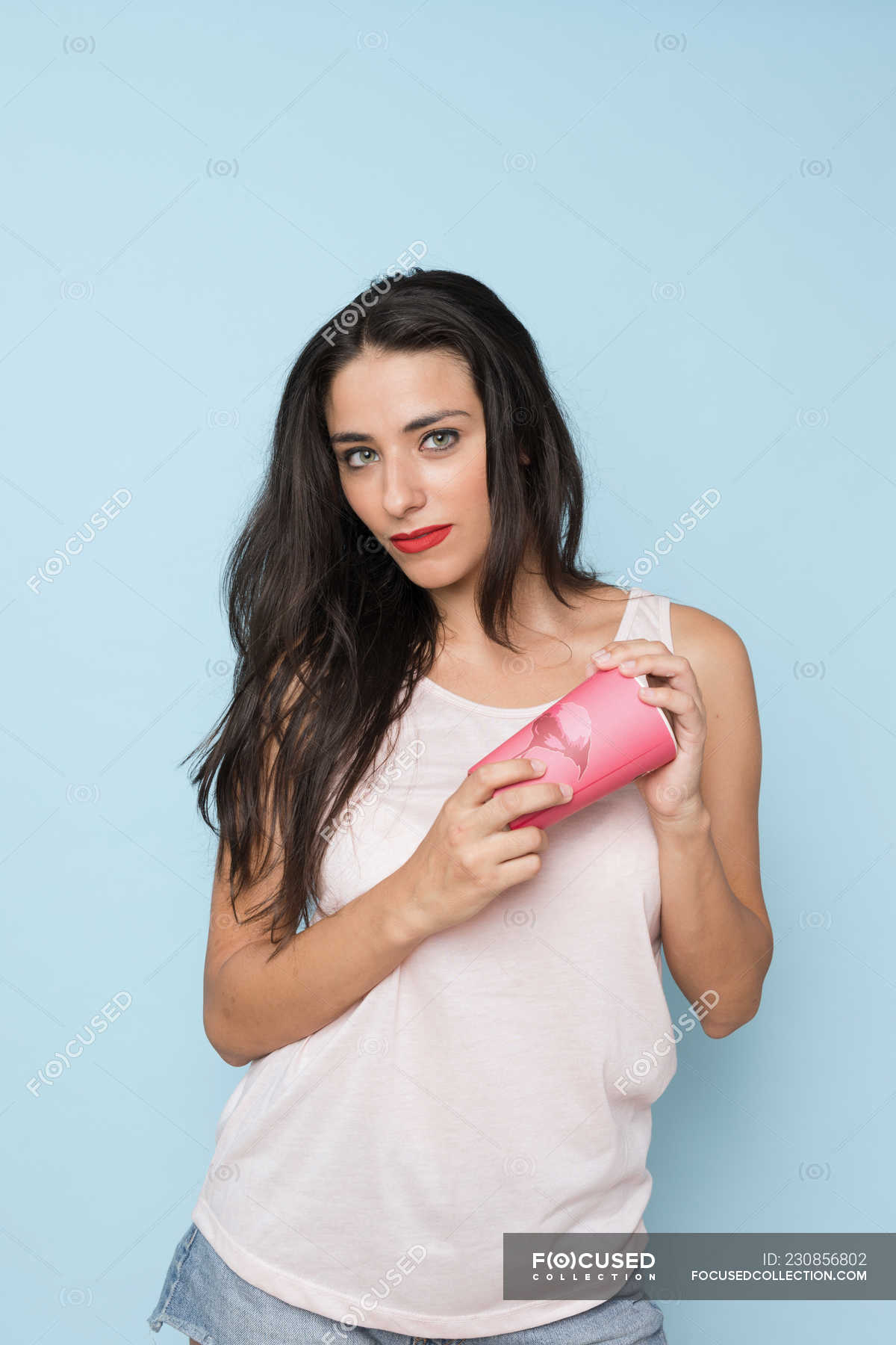 Jorge Garcia RomeuBrunette woman with red lips in white