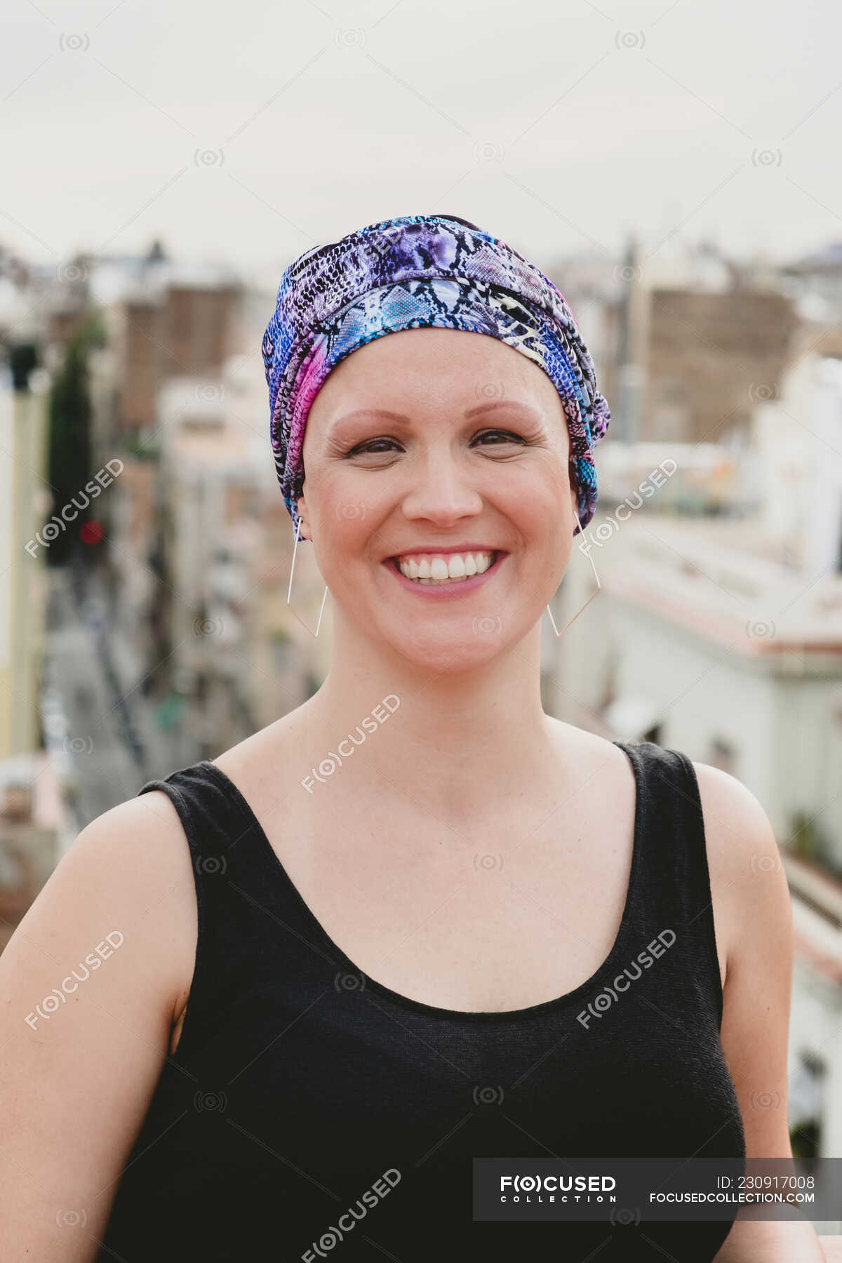 Woman in head cloth standing on rooftop — vivid, joyful - Stock Photo ...