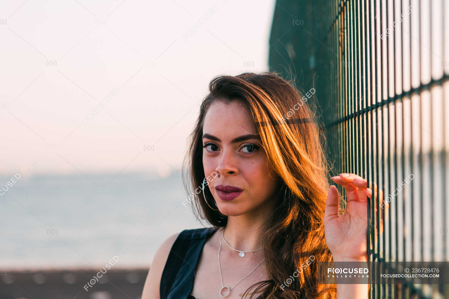Portrait of young attractive holding grating in sunny day — people, bay Stock Photo 236728476