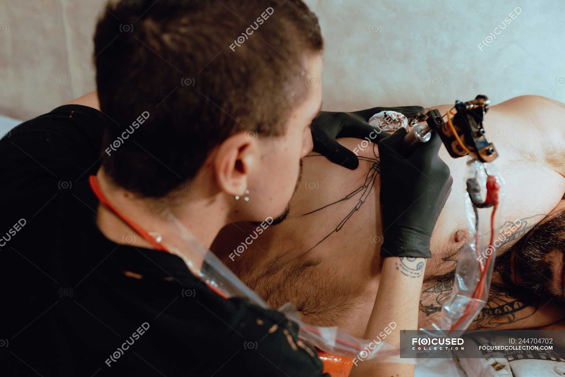 Stylish woman making tattoo — body, paint - Stock Photo | #244704702