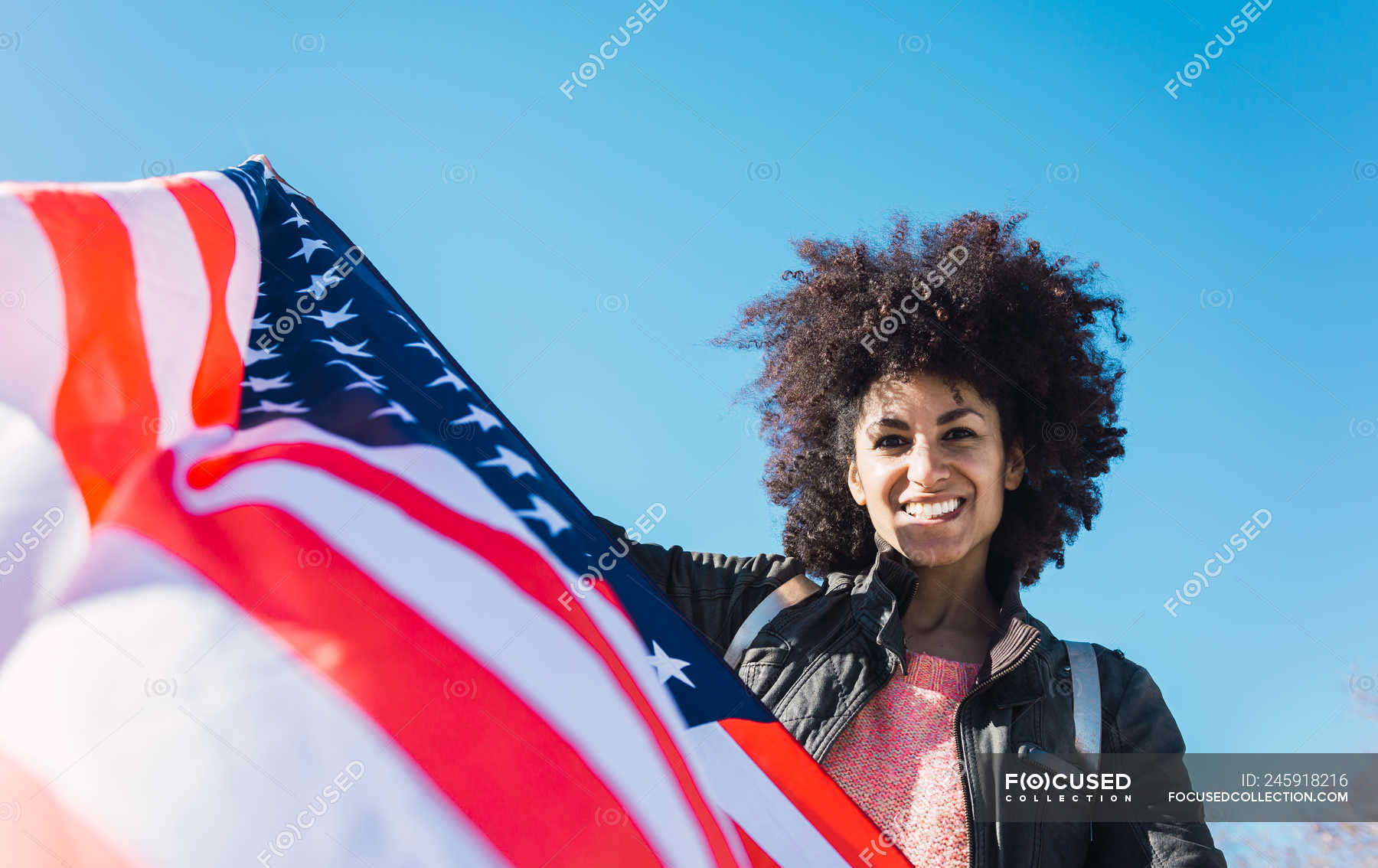 Black Woman With Afro Hair And An American Flag Celebrating The ...