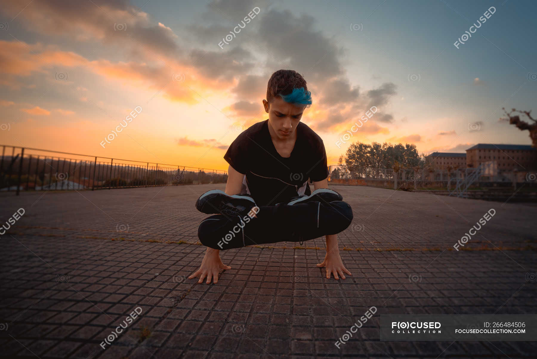 Teenager Break Dancing In Evening Park Dramatic Sky Teenage Boy