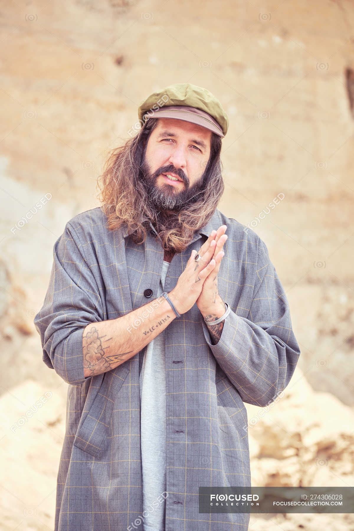 Stylish Bearded Man With Long Hair On Street Posing And Looking At Camera Portrait Cute Stock Photo